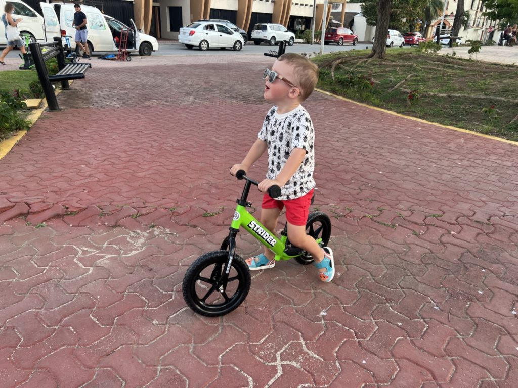 a child riding a strider bike in mexico