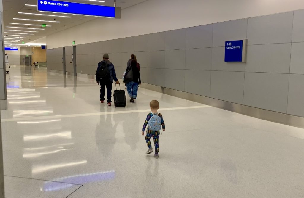 Walking at the airport with toddler